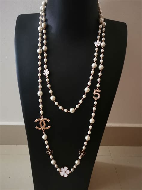 chanel replica pearls|Chanel inspired long pearl necklace.